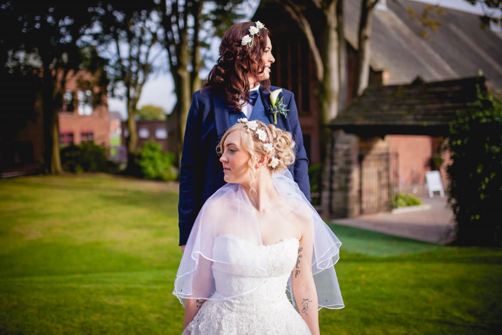 Two brides looking in opposite dirrections