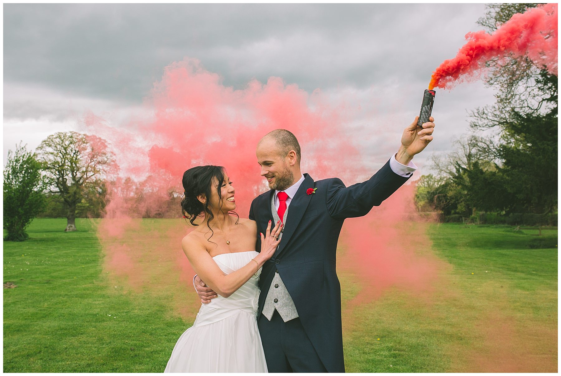 Red Smoke and a loving couple