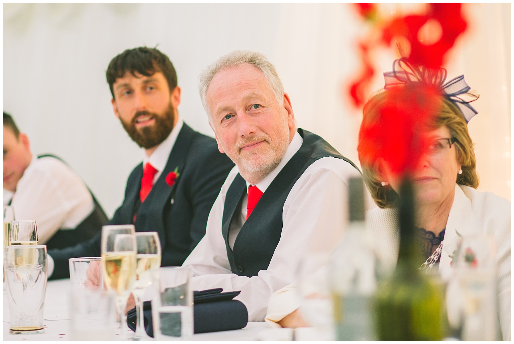 Grooms father watches on during speeches
