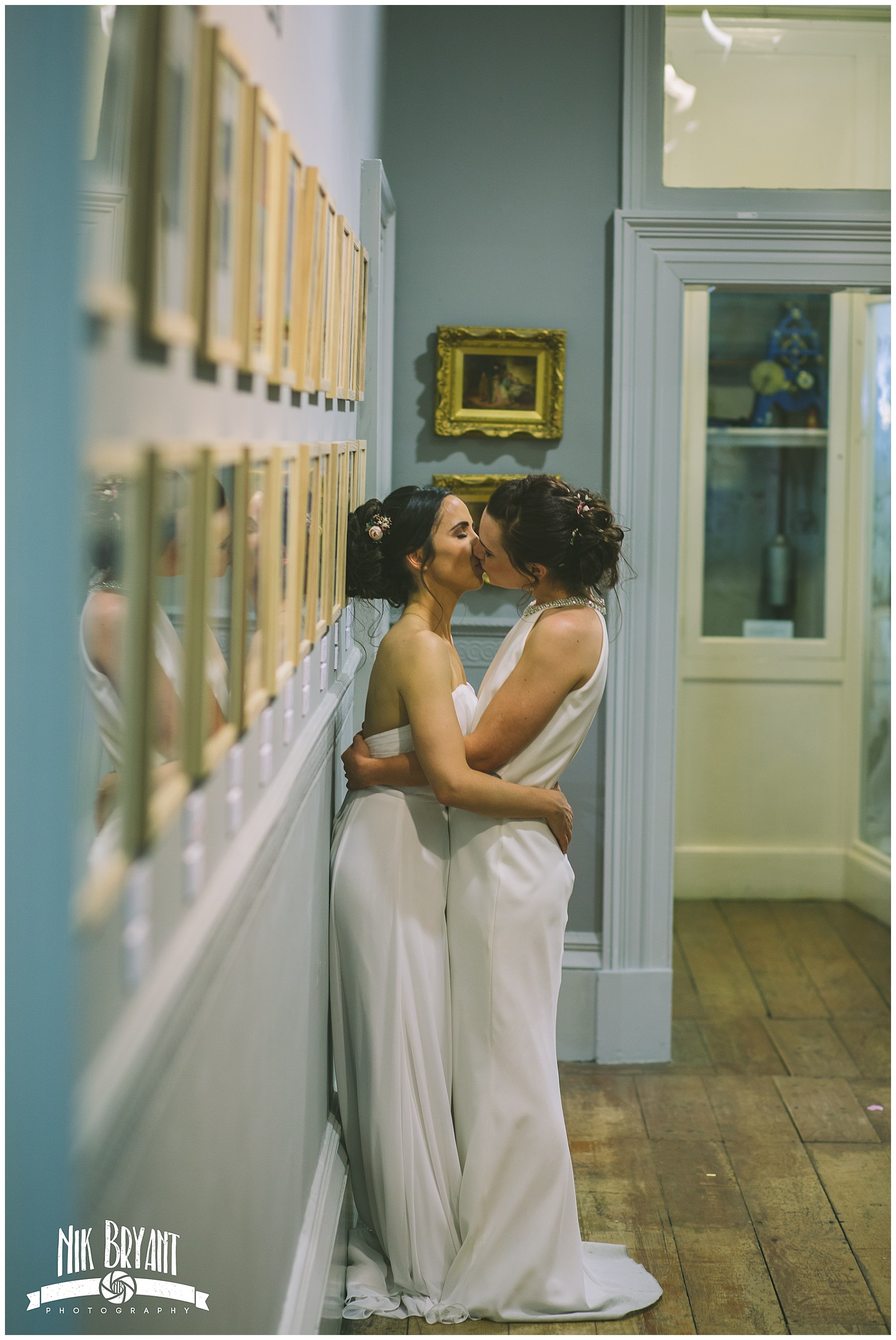 couple share an embrace in the museum of The Whitaker