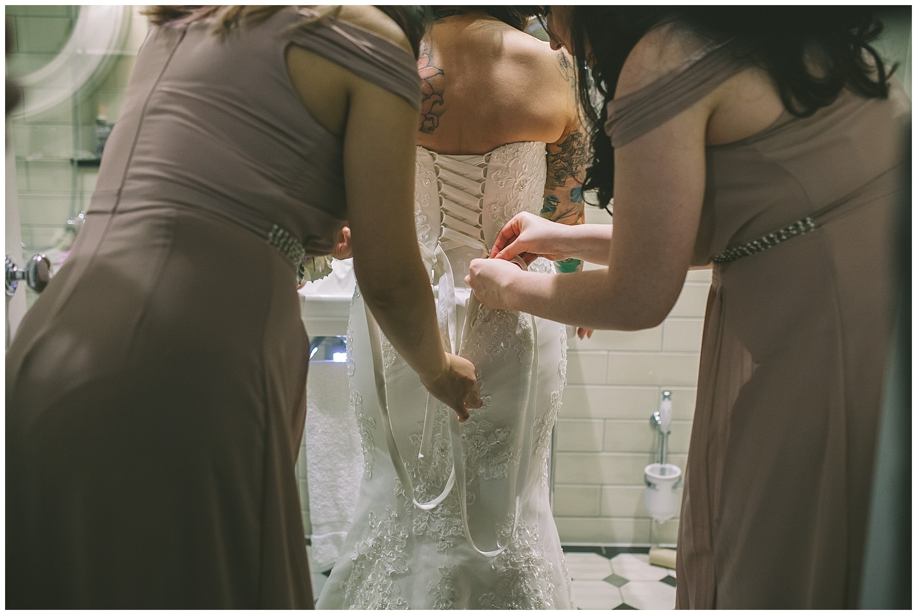 bridesmaids lace up wedding dress