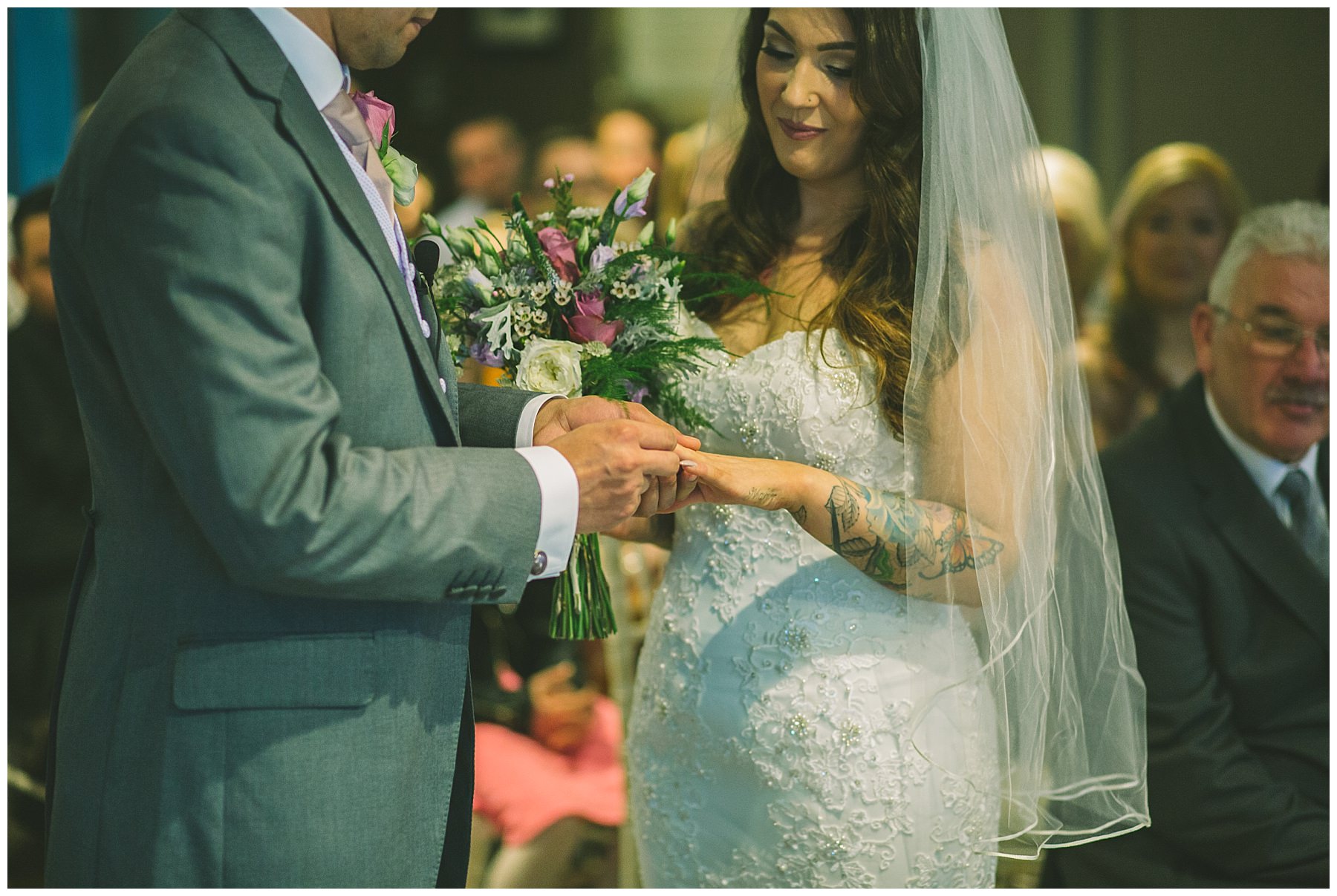 exchange of rings during king street townhouse ceremony