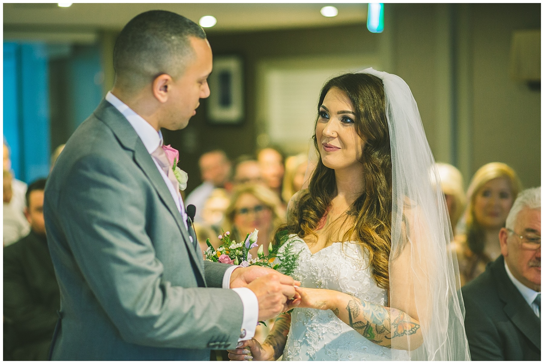 bride and groom share a moment during wedding ceremony