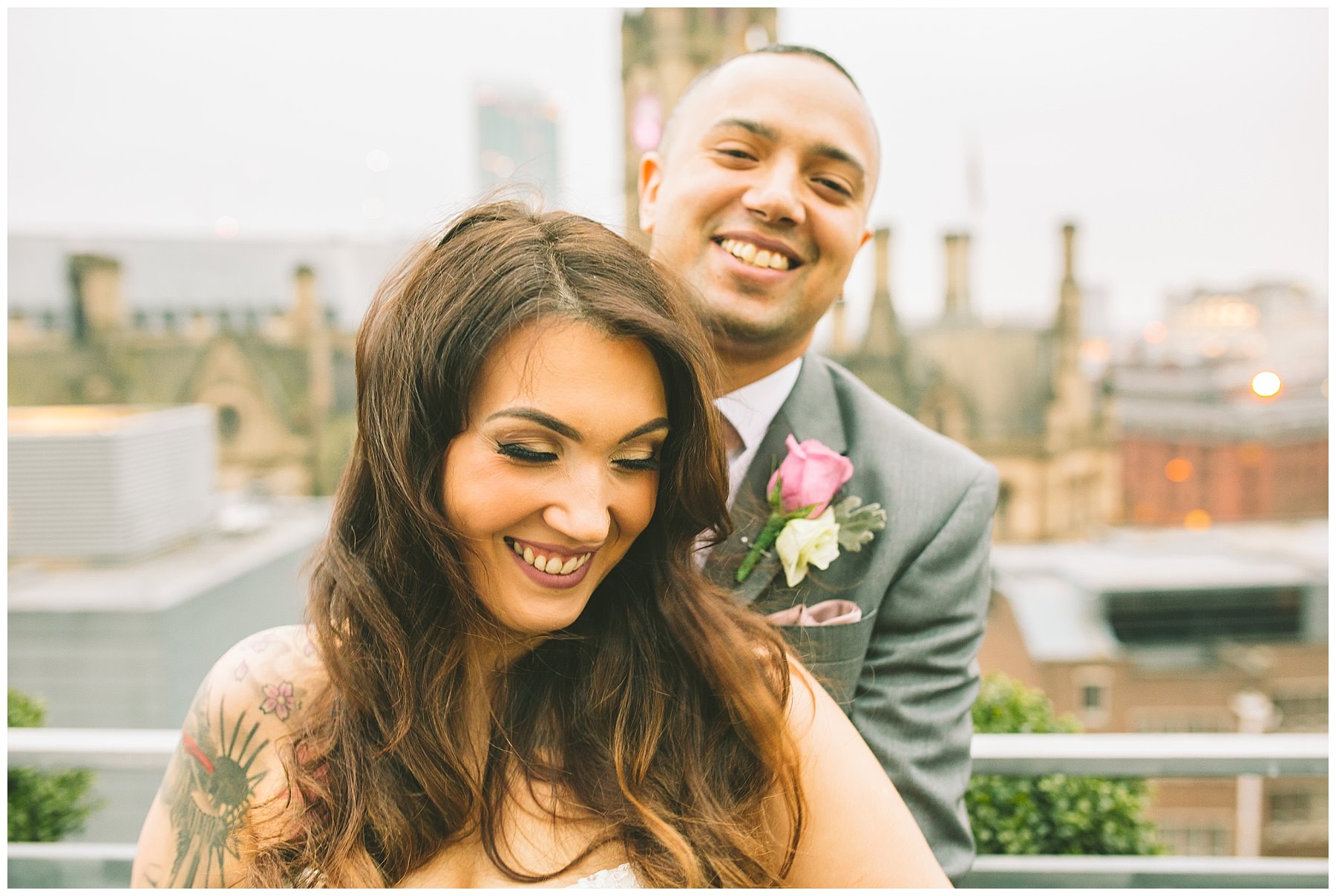 Couple share moment during winter wedding on the roof of King Street Town House