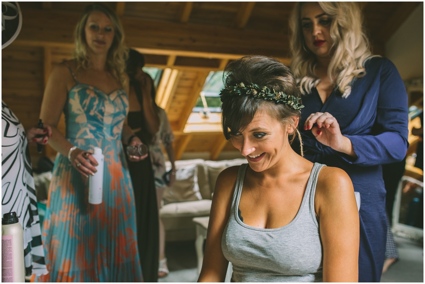Bride has flower crown fixed in place for her Oak Tree of Peover wedding