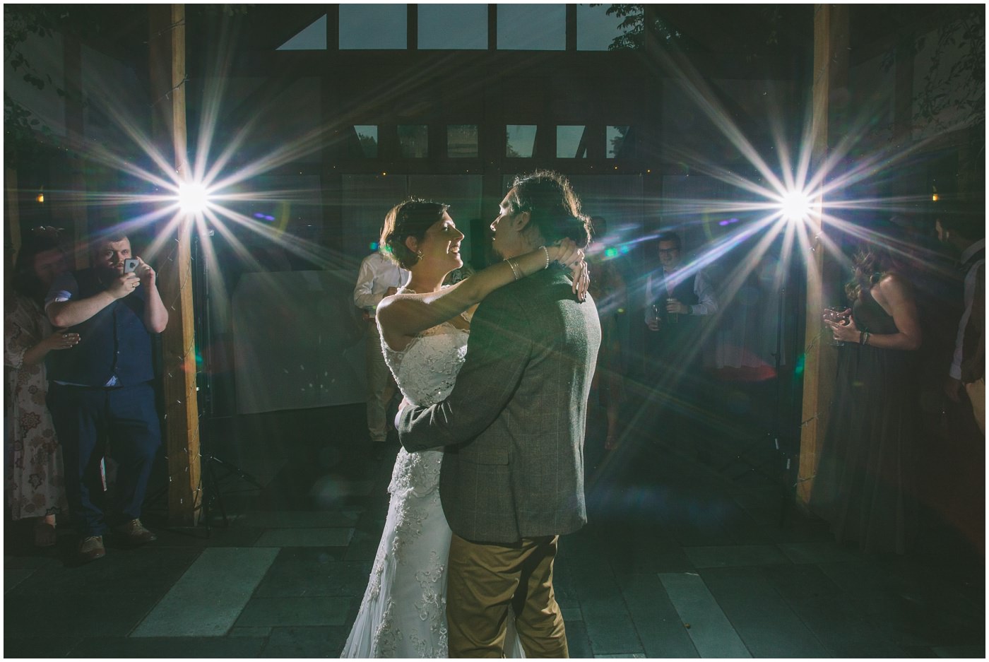 Bride and groom during their first dance at the oaktree of peover