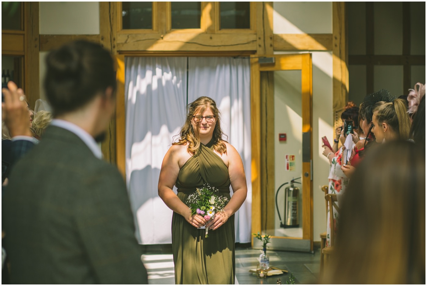bridesmaid enters at the oak tree