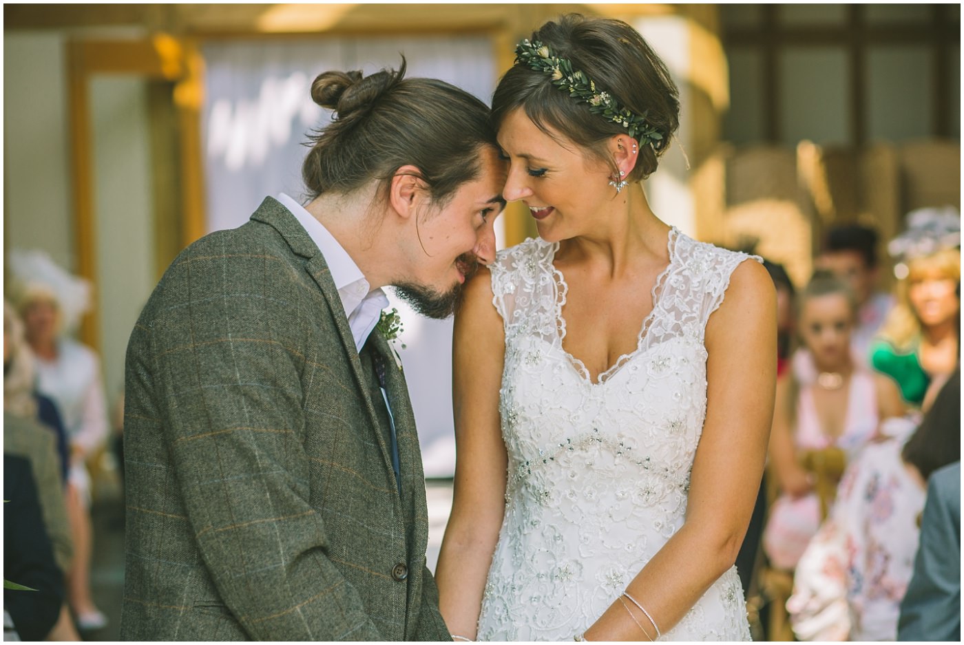 Bride and groom have a moment during the oaktree of peover wedding ceremony