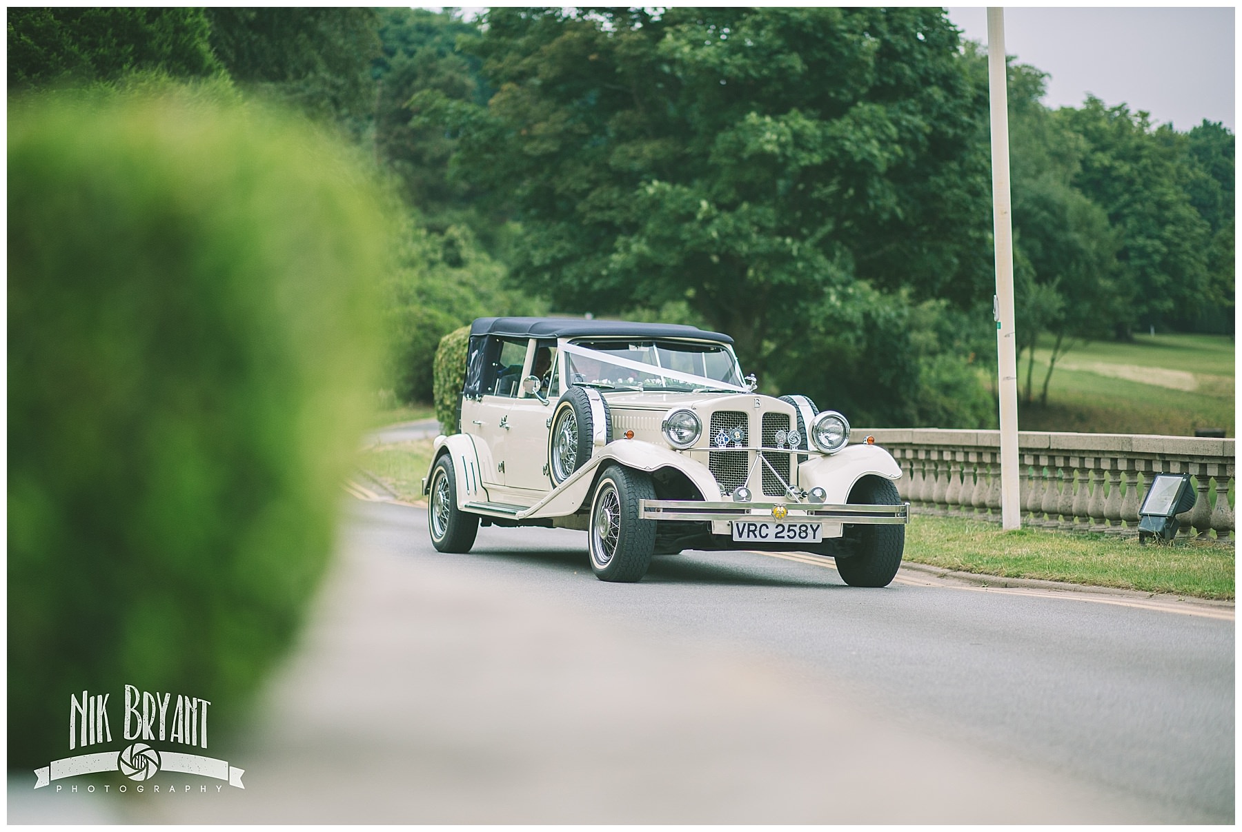 Bridal car arrives at Shrigley Hall Hotel