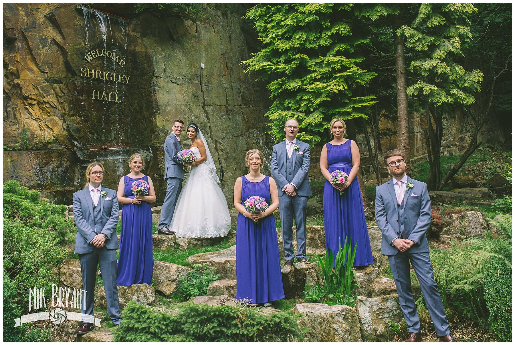 Bridal party at the fountain at shrigley hall
