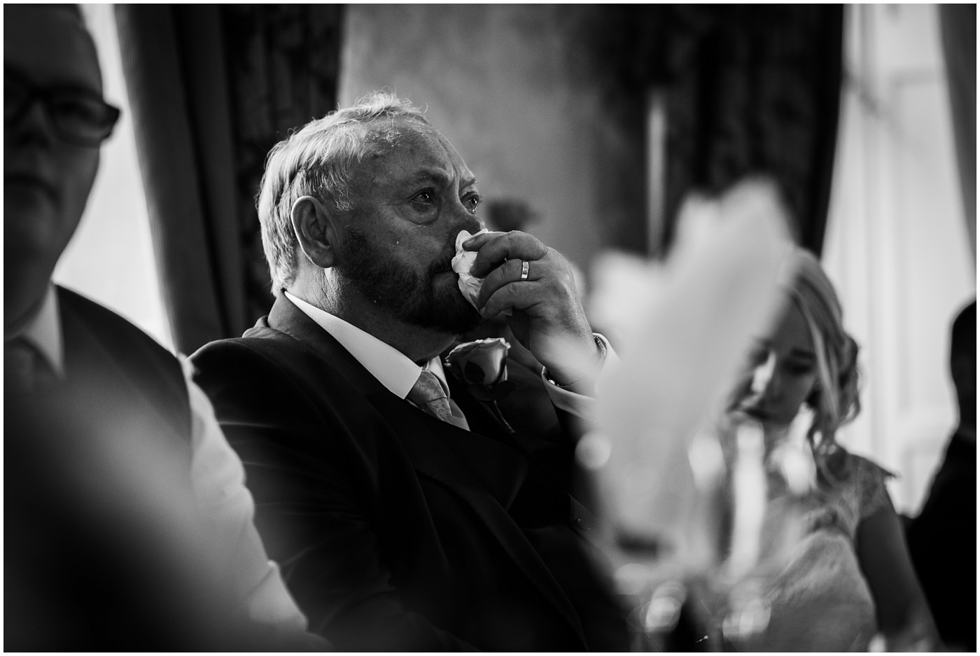 Father of the groom sheds a tear as his son gives a speech at Waterton Park