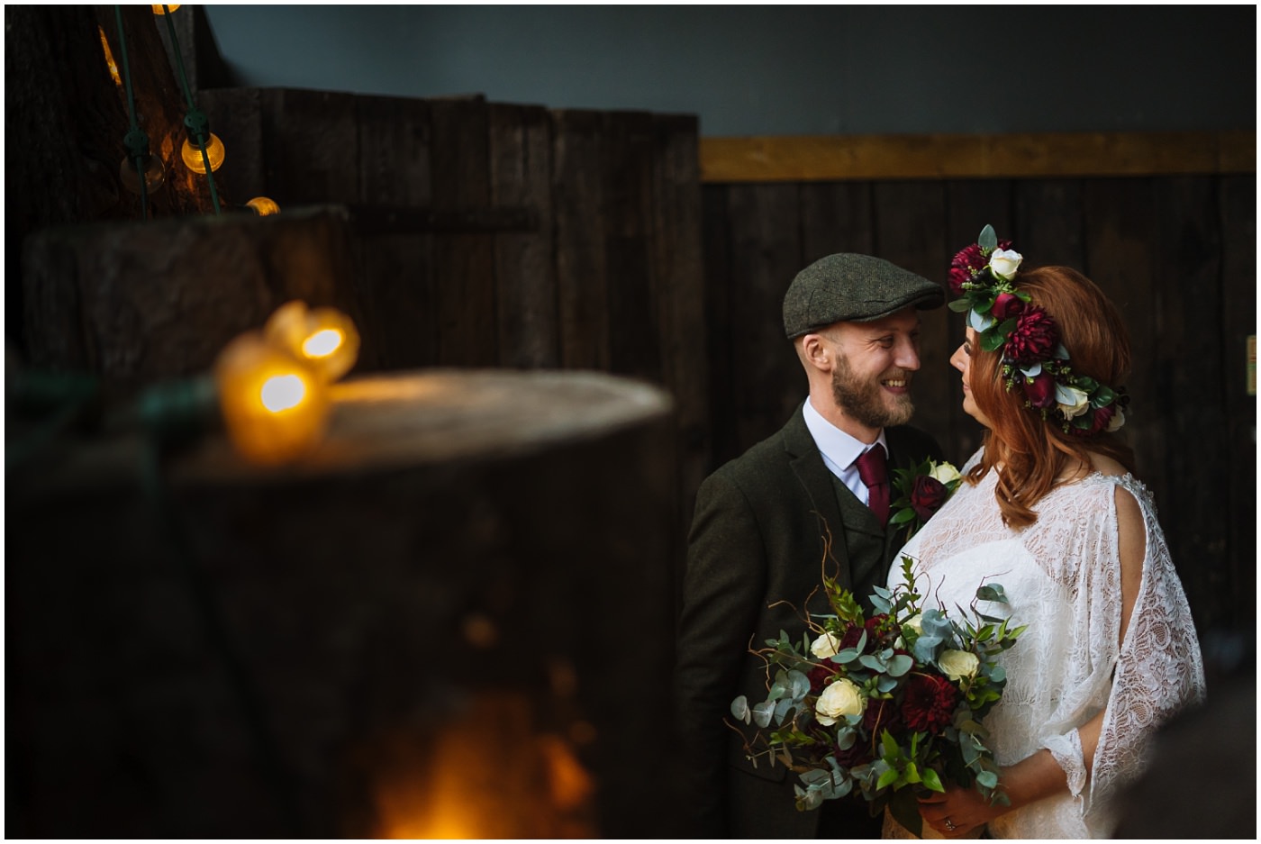 newly married couple in the barn at Owen House Wedding Barn