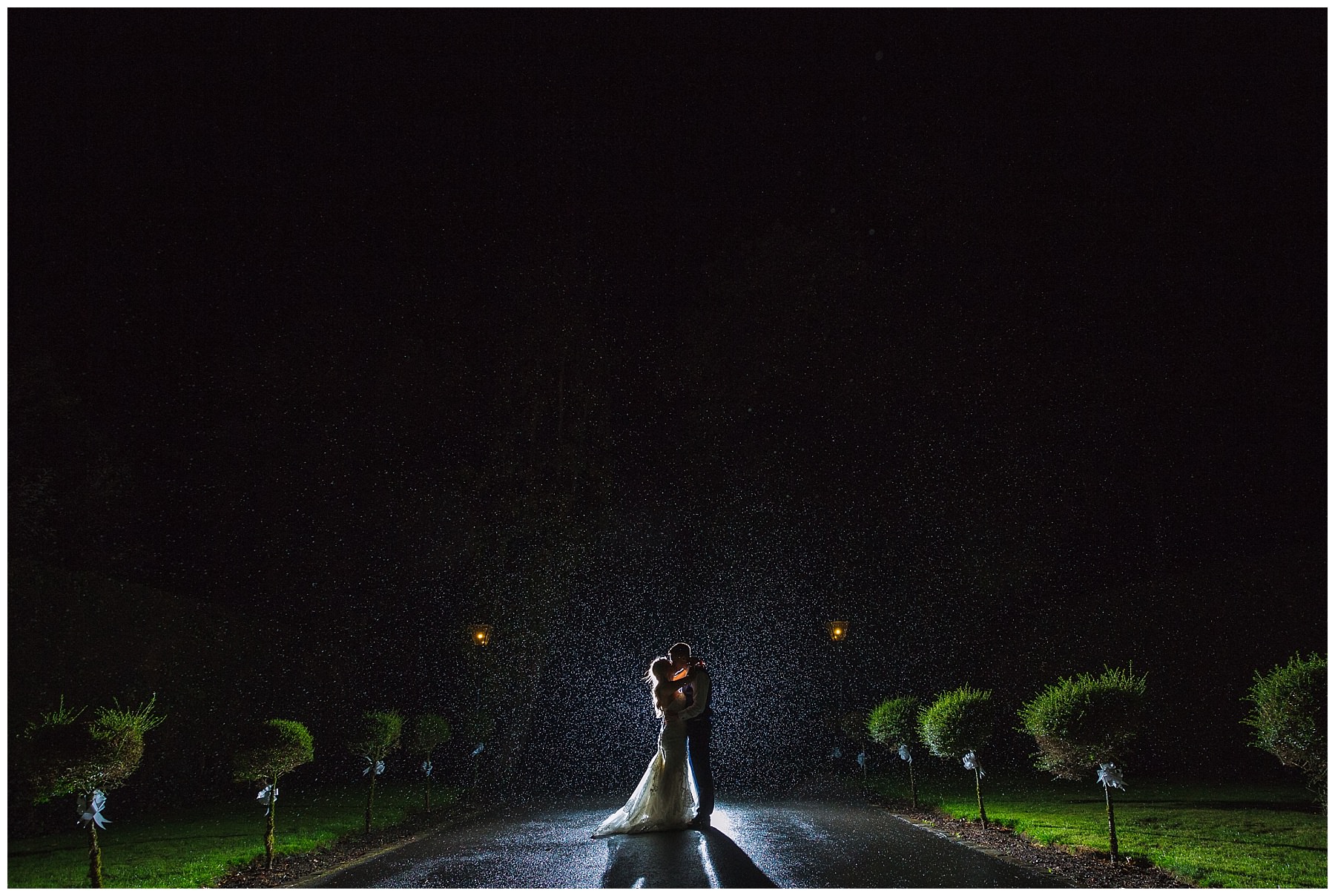 Rainy wedding day portraits at Bartle Hall