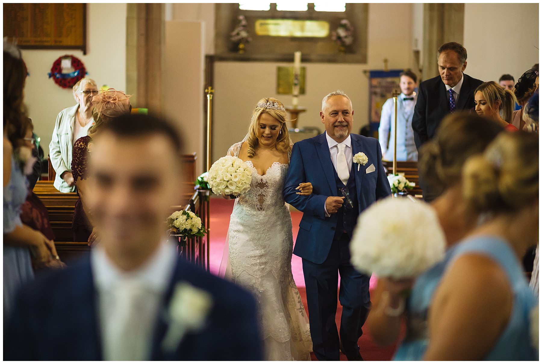 bride walks down isle with dad