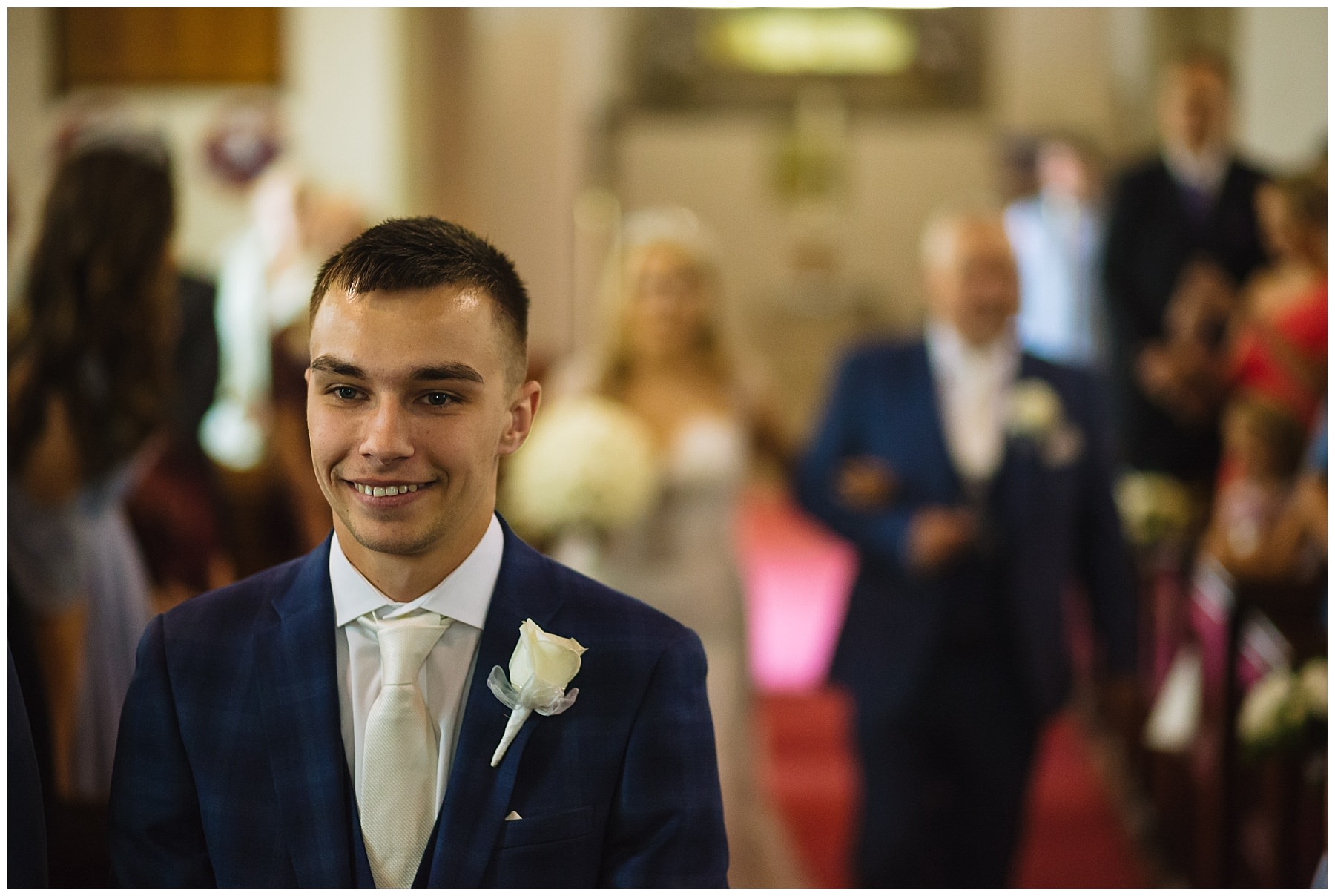 groom waiting in anticipation for bride