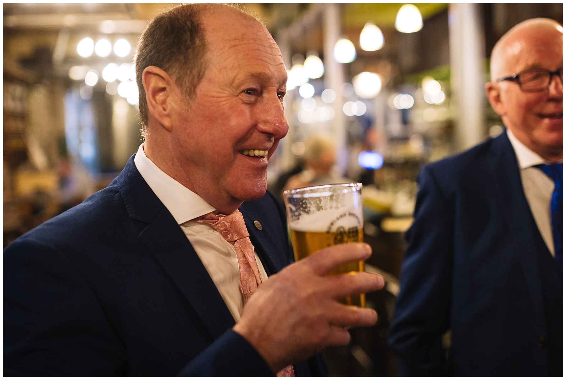 Groom drinking Bowland Beer