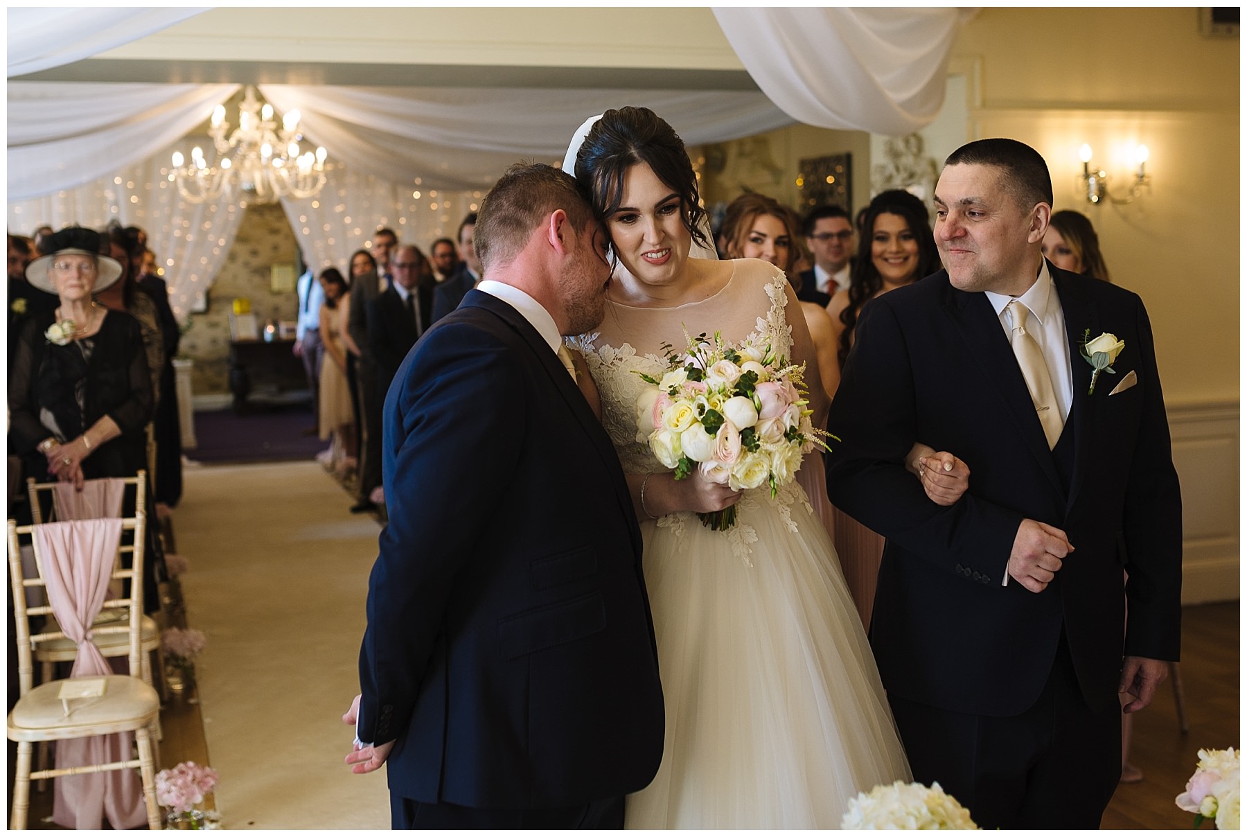 bride and groom during eaves hall wedding ceremony