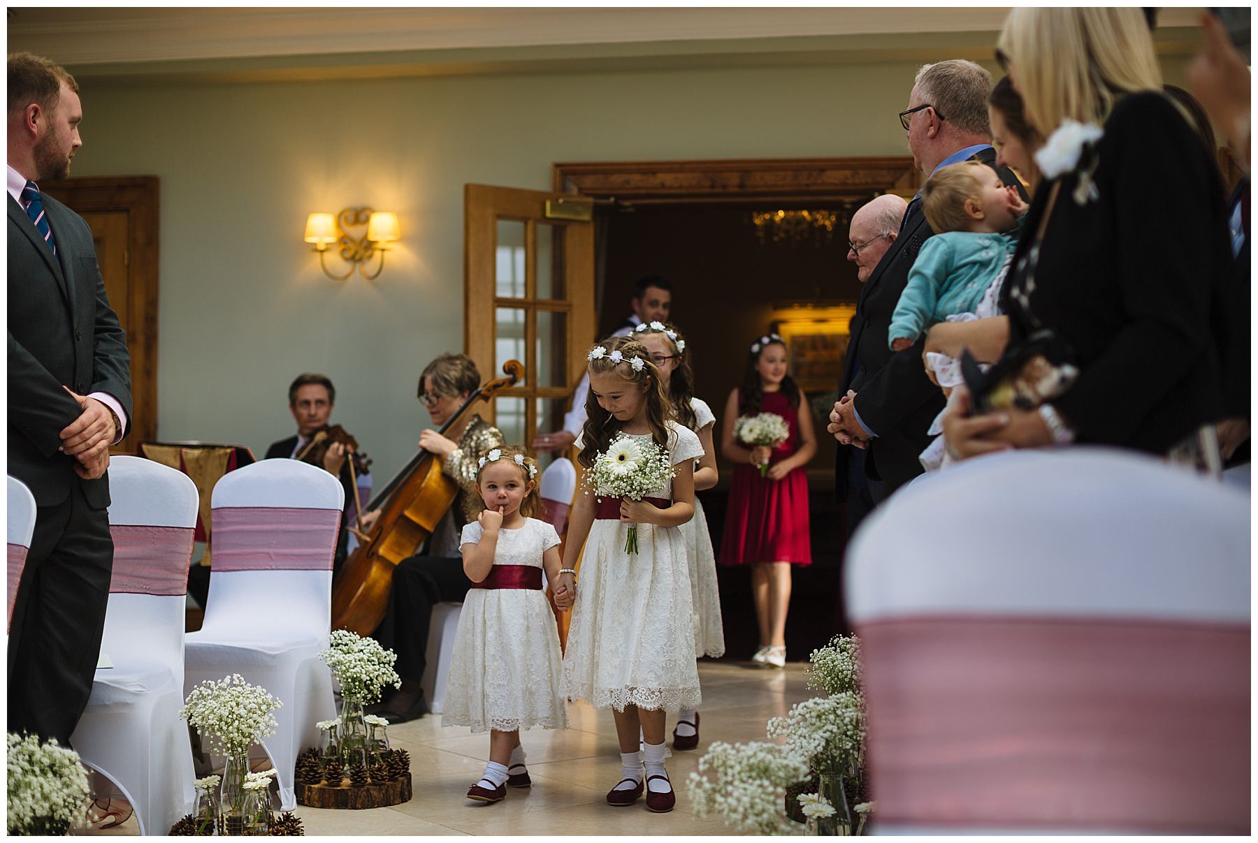 flowergirls arrive for wedding ceremony