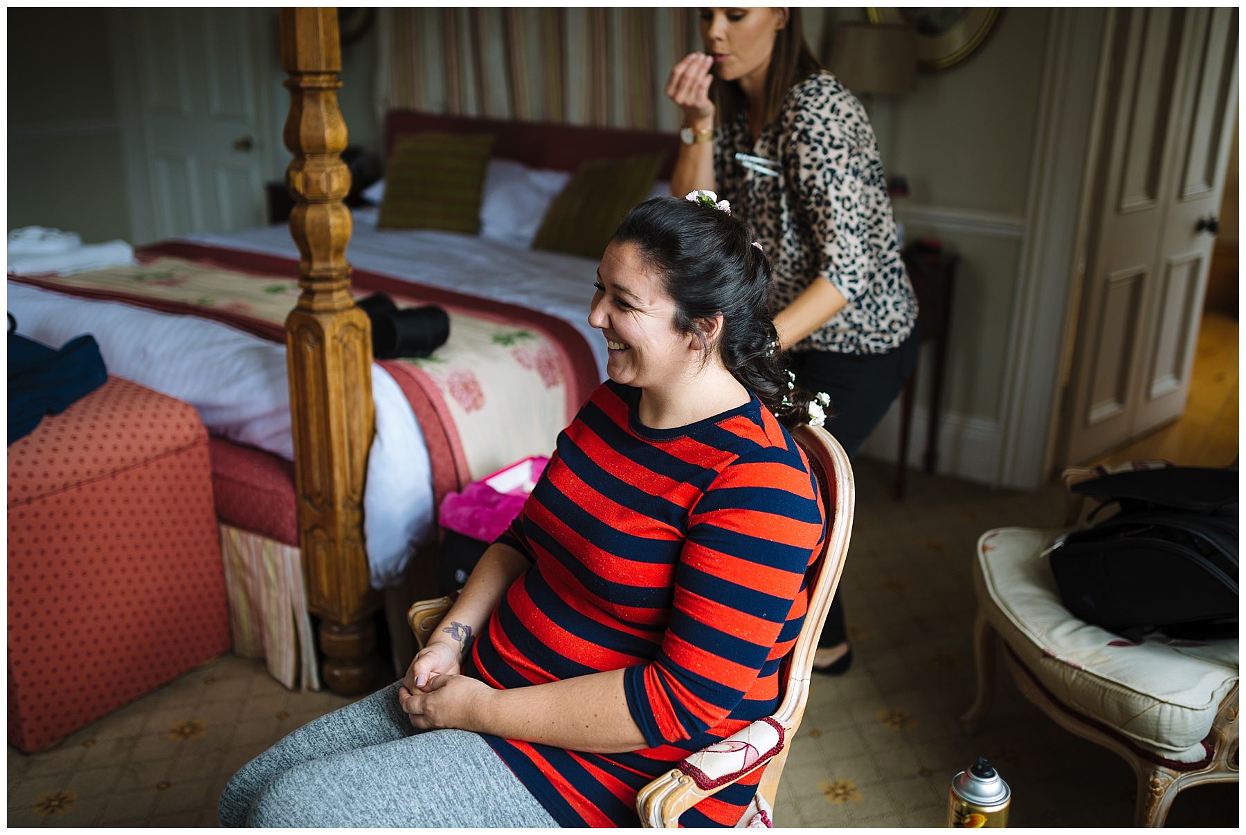 bride smiles during willington hall bridal prep