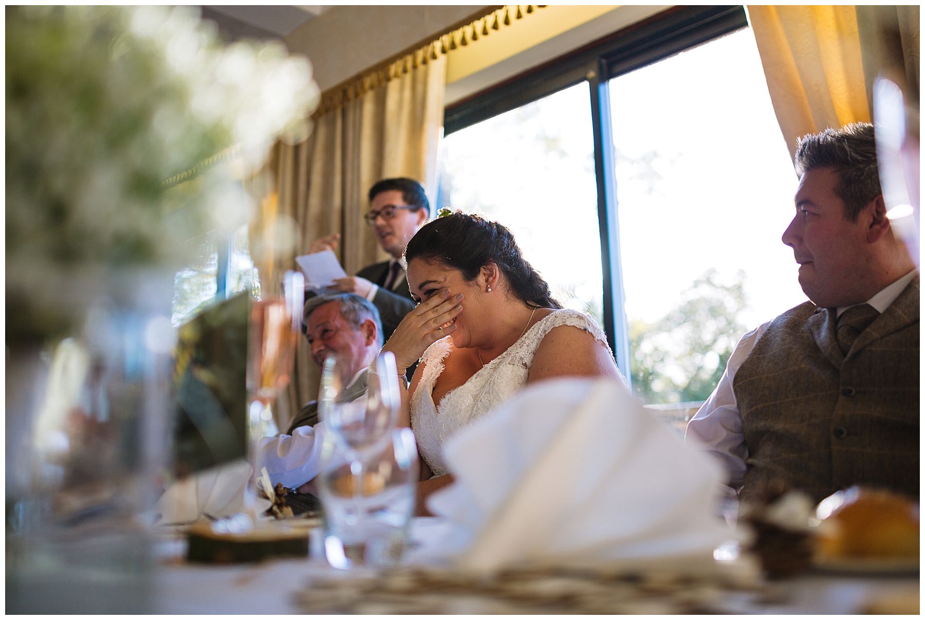 bride laughs during father of the bride speech at Willington hall