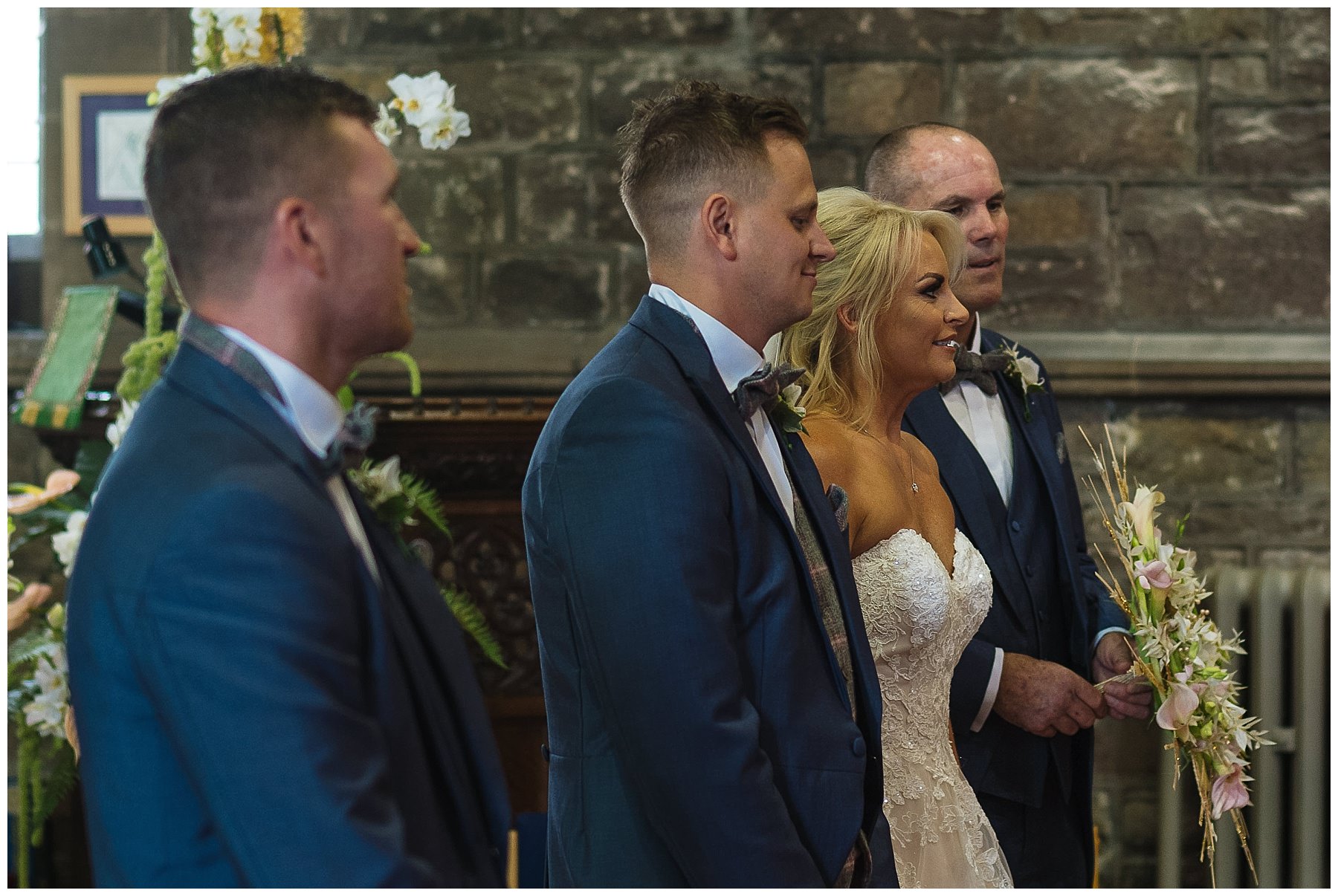 bride and groom at front of church