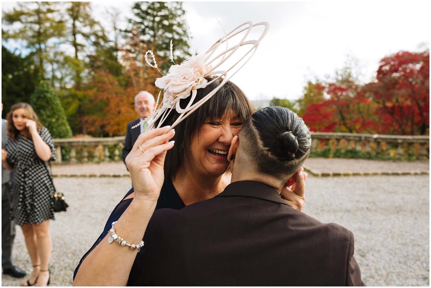 Post Ceremony hugs and congratulations at Eaves Hall wedding