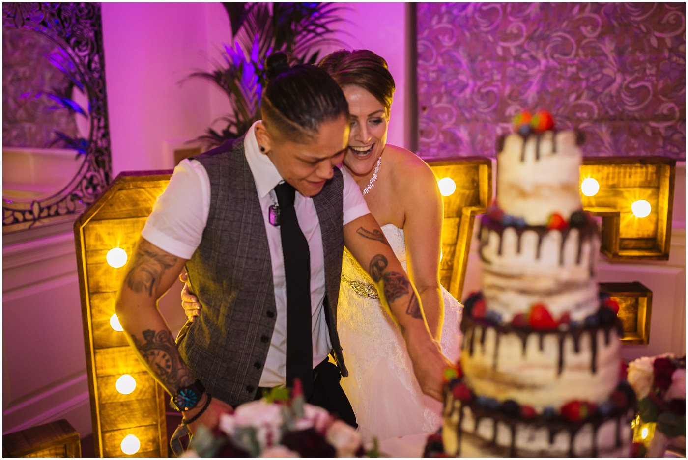 Brides cut incredible wedding cake