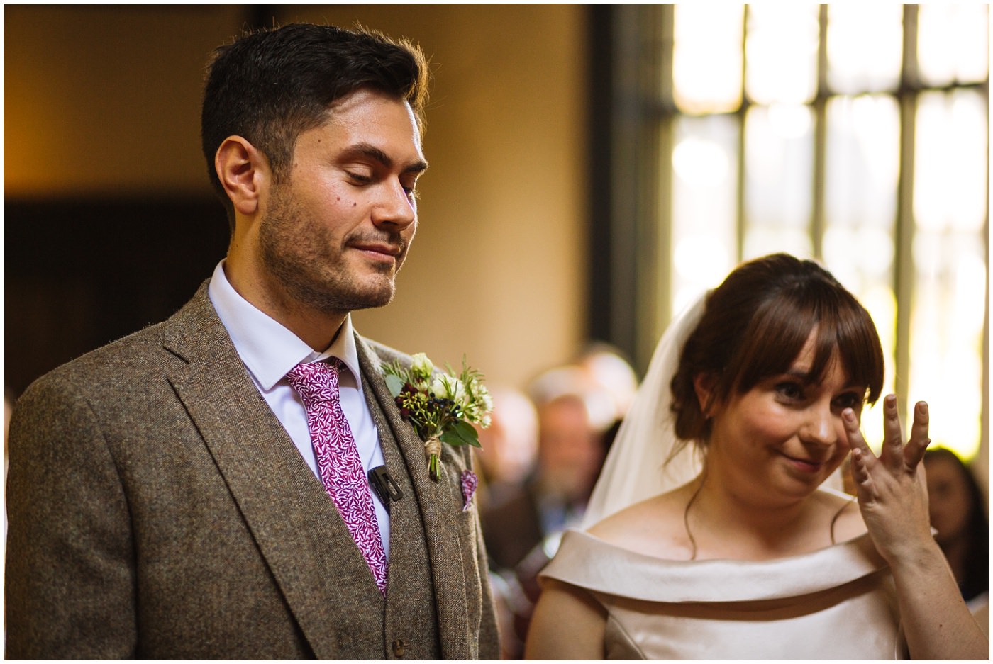 bride and groom during wedding ceremony at samlesbury hall