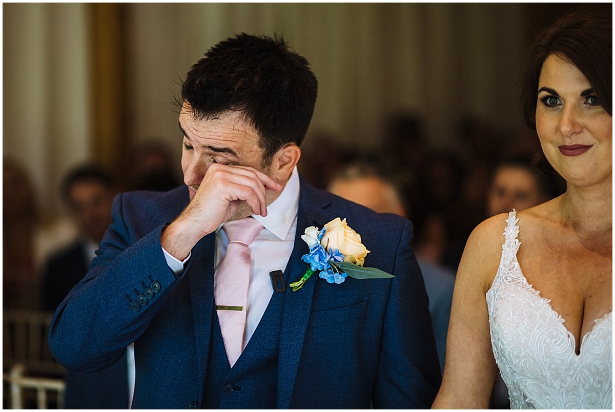 Groom sheds a tear during wedding vows at Styal Lodge