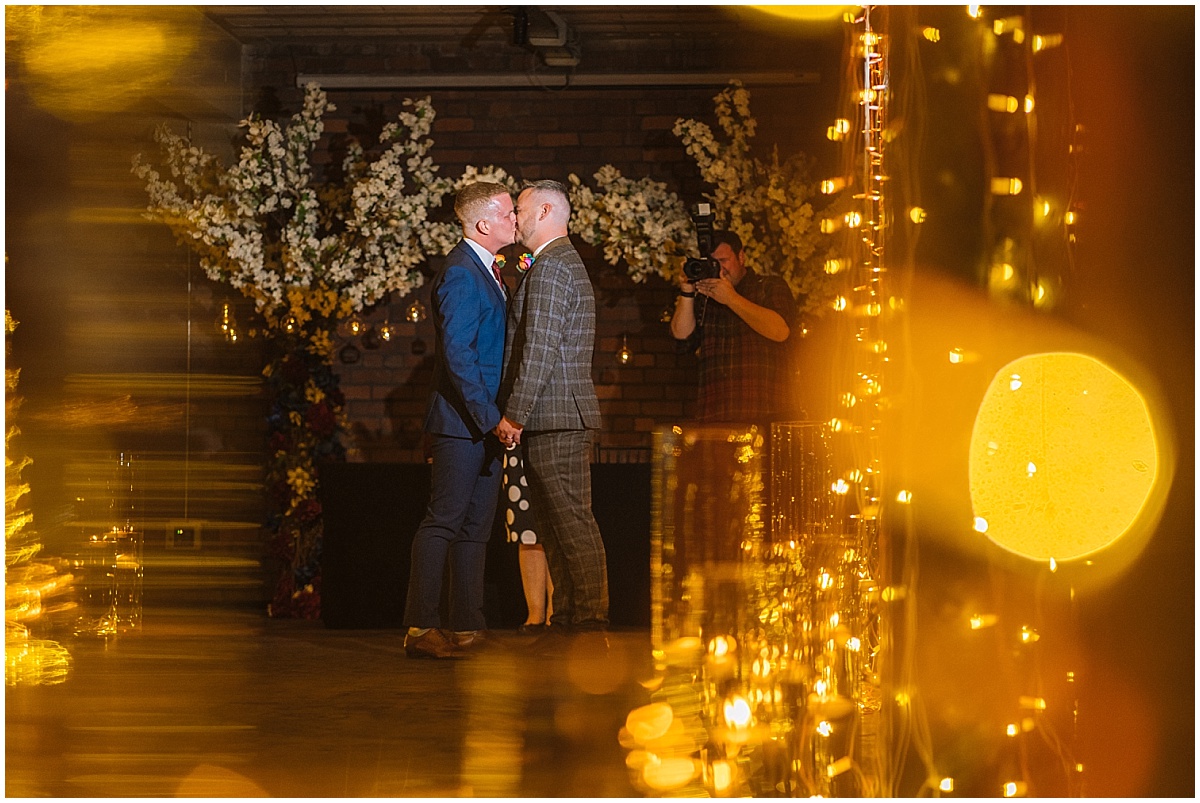Grooms first kiss at Victoria Warehouse
