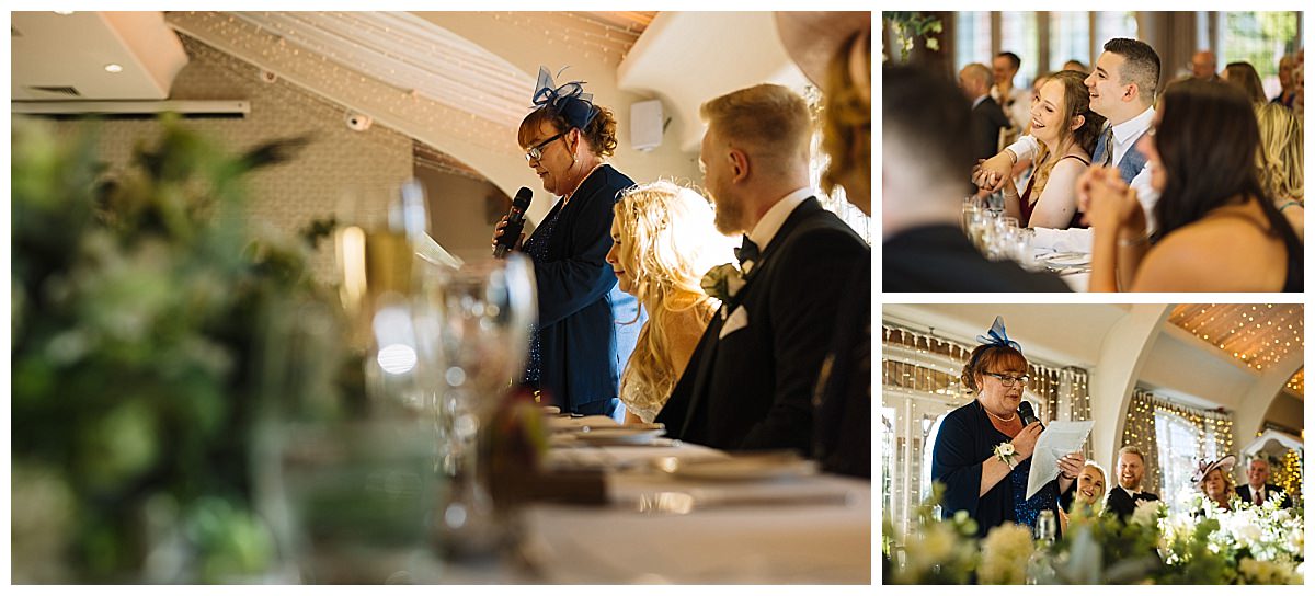 A speaker addresses the audience at a wedding reception, while guests listen and enjoy the moment, showcasing a blend of emotions and elegance in a decorated venue.