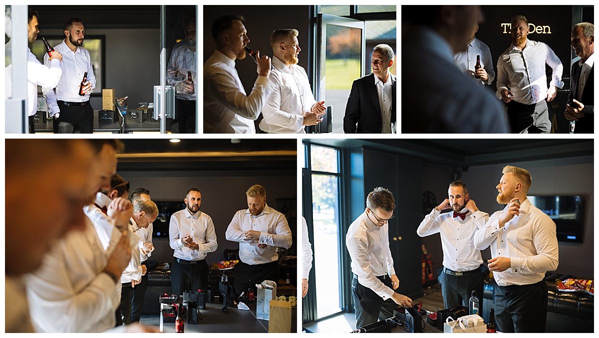 A group of groomsmen in black tiel attire sharing laughs and getting ready for a wedding at Colshaw Hall, with some grooming and drinks visible in a stylish indoor setting.