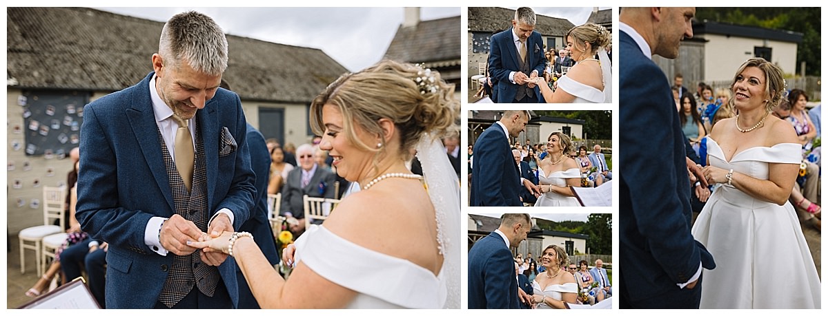 A couple exchanging rings during their wedding ceremony, surrounded by family and friends, with expressions of joy and love visible on their faces.