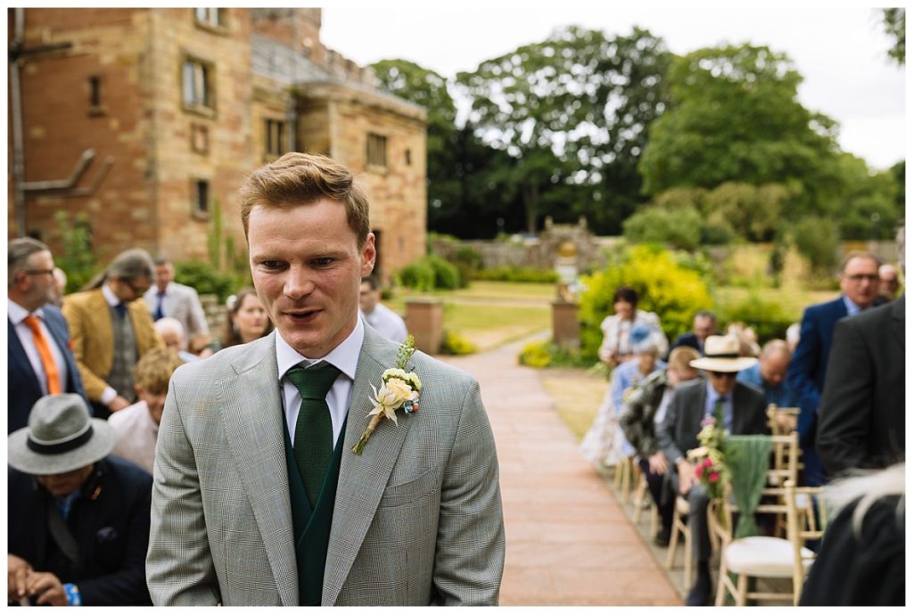 groom Waiting at an outdoor wedding ceremony