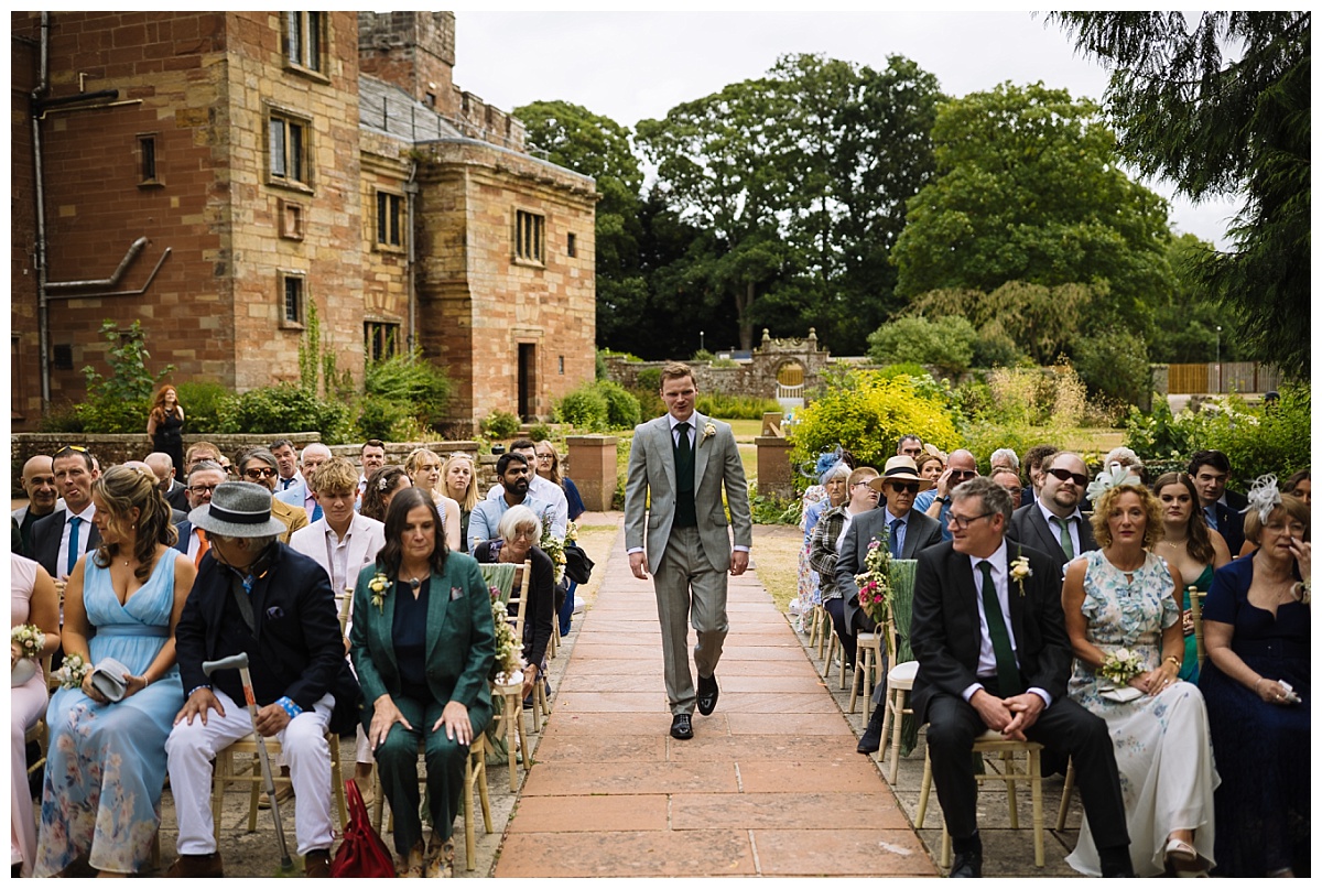 Groom wedding entrance at dalston hall